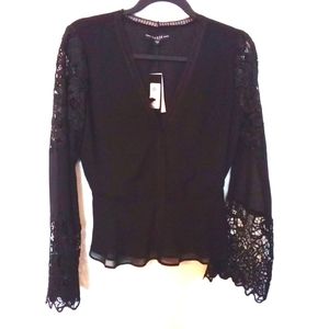 GUESS Los Angeles Women's Black Peplum Blouse with Lace Details